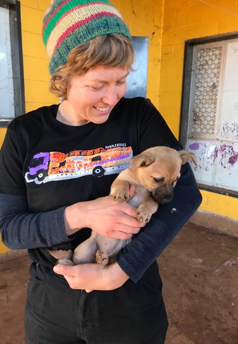 Annabelle with camp puppy, Yuendumu, Warlpiri Country.