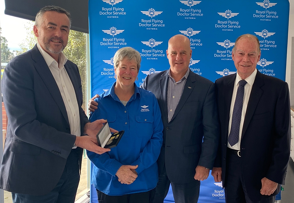 Cath Walker pictured with government and RFDS representatives. Photo credit Bec Symons, ABC.