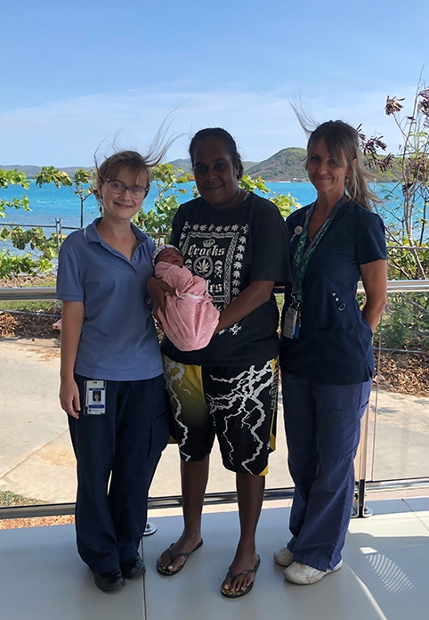 Mum Louisa and baby Angelina with Maxine (left) and midwife Tomika.