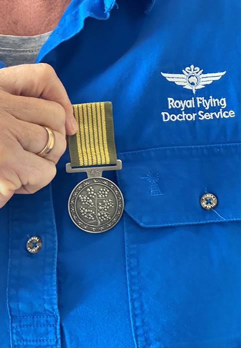 Cath Walkers's National Emergency Medal awarded for her work in Mallacoota, Victoria following the devastating Black Summer bushfires of 2019/2020. Photo credit Bec Symons, ABC.