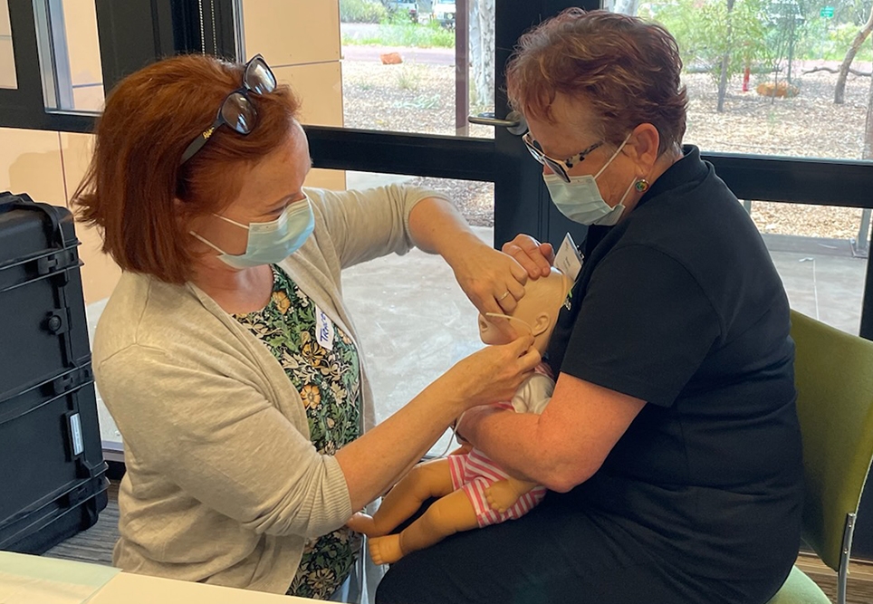 Participant Tracey and Sharon placing a nasogastric tube in the manikin at a recent PEC course.