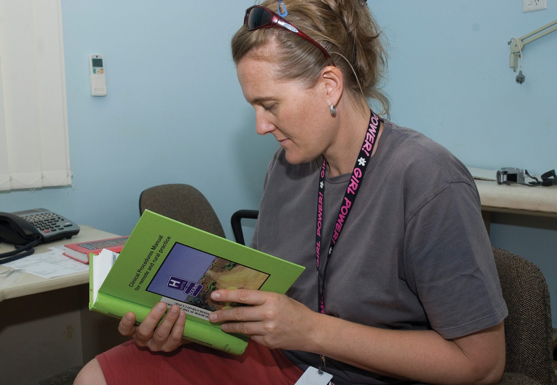 Vanessa Page, former CRANAplus Board Member, peruses the Clinical Procedures Manual.